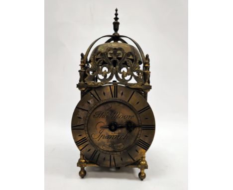 Early 18th century-style brass lantern 30-hour clock, the dial engraved for Thos Moore, Ipswich, with black Roman numerals to