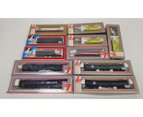 Eleven boxed Lima Models 00 gauge rolling stock to include No.305664 PTA 100t ore tipper, No.302908W BRT fuel wagon, No.30566