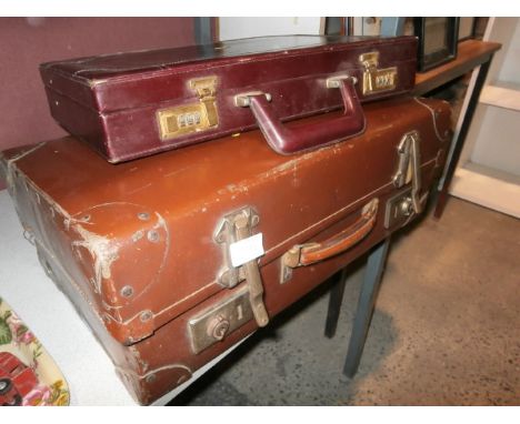 Vintage suit case and a later brief case