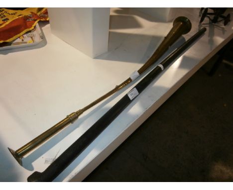 Brass horn and a hard wood walking stick