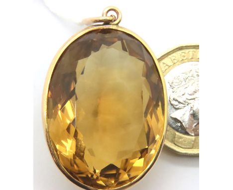 9ct bound large citrine pendant. Pendant 33mm. 14g, some light surface marks but no visible chips. P&amp;P Group 1 (£14+VAT f