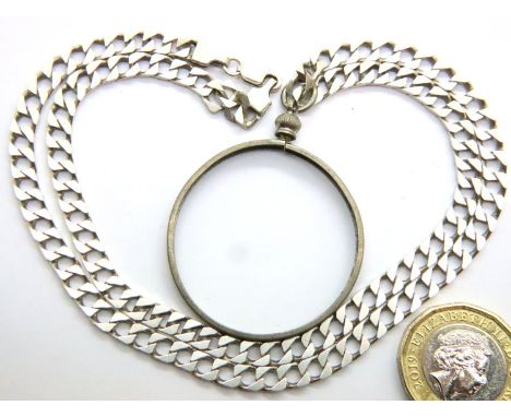 925 silver curb necklace with a coin mount pendant, 22g. P&amp;P Group 1 (£14+VAT for the first lot and £1+VAT for subsequent