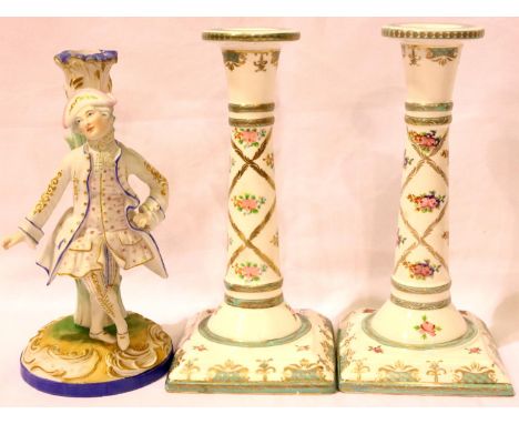 Pair of Continental candlesticks, H: 24 cm and a further figurine. Some crazing to candlesticks but otherwise no cracks, chip