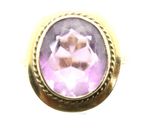 9ct gold amethyst set dress ring, size K/L, 4.0g. P&amp;P Group 1 (£14+VAT for the first lot and £1+VAT for subsequent lots) 