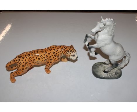 A Beswick model of a cheetah and a Beswick model of a horse AF