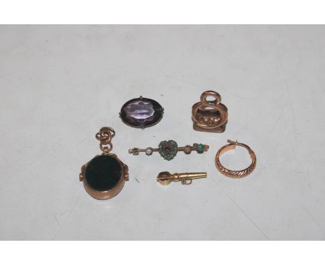 A 9ct gold mounted swivel fob set with bloodstone; a single 9ct gold ear-ring; a yellow metal mounted seal; two brooches etc.