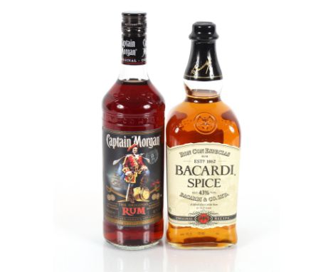 A bottle of Ron Con Especias Bacardi Spiced Rum, 1L, 43% Vol; a bottle of Captain Morgan Rum, 70cl 40% Vol; and a bottle of G