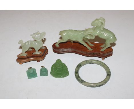 A box of jade coloured ornaments to include dragon, Buddha etc. and jewellery to include bangle and pendants 