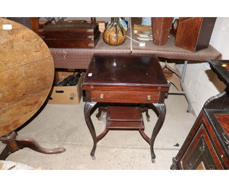 An Edwardian mahogany envelope card table fitted single drawer