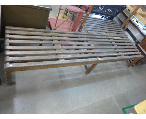 A vintage wooden school bench