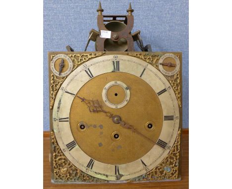 An early 20th Century longcase clock movement and dial, the movement playing four airs and chiming on eight bells, the brass 