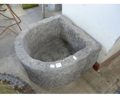 A garden D-shaped trough