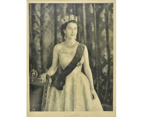 * Elizabeth II (Queen of Great Britain &amp; Philip, Duke of Edinburgh). A pair of studio portraits by Baron, signed by the s