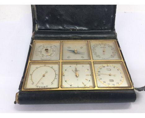 A cased multifunctional pocket barometer, clock, thermometer, hygrometer etc. Shipping category D.