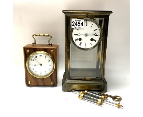 A 4 glass mantle clock with mercury pendulum, 26cm together with a small brass mounted french clock. 19cm. (D).