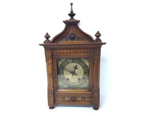 Victorian Gothic style mahogany mantle clock with brass square dial, pendulum and key. 17x24x48cm approximately. Category D p