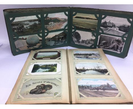 Four albums of vintage postcards, various subjects including topographical, humorous etc. Shipping category C.