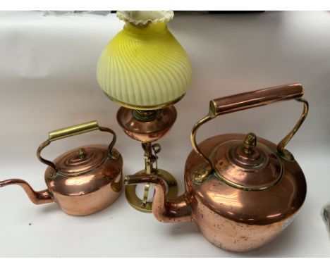 2 Victorian copper and brass kettles together with an arts and crafts brass and copper oil lamp.