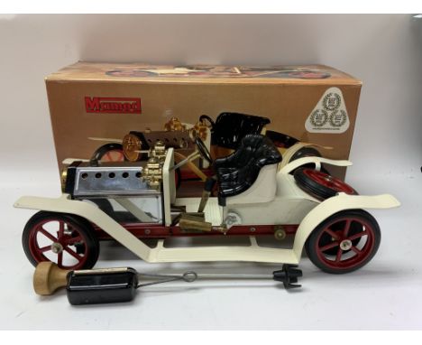A vintage Mamod motor car with the original box and accessories.