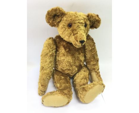 A Steiff style bear, approx length 42cm.