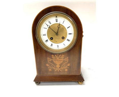 An Edwardian inlaid mantle clock with enamelled and gilt brass dial. (No pendulum.)