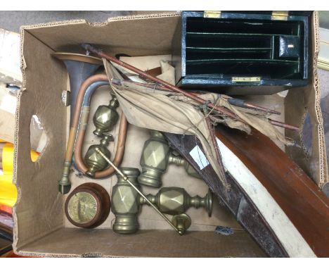 A collection of interesting items comprising a bugle, leather cased stationery box, model boat, Clock etc. Shipping category 