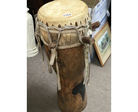 A tribal wood and skin bongo drum height 70cm