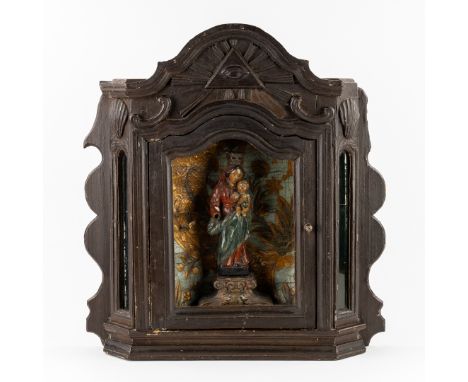 An Antique Wooden Sculpture, Madonna and Child, Southern Europe, in a Display Cabinet decorated with an Eye of Providence and