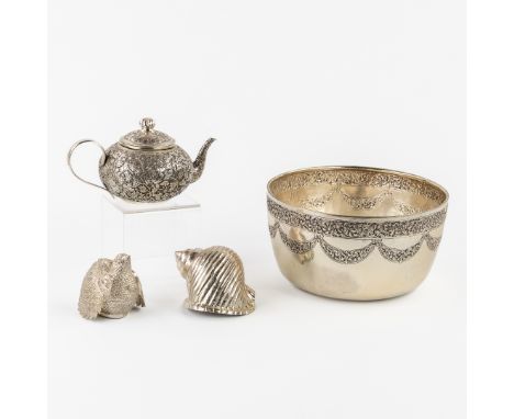 A Collection of Cambodian Silver, A Teapot, Bowl, Shell and Box in the shape of a Quail. Silver.Teapot, decorated with floral