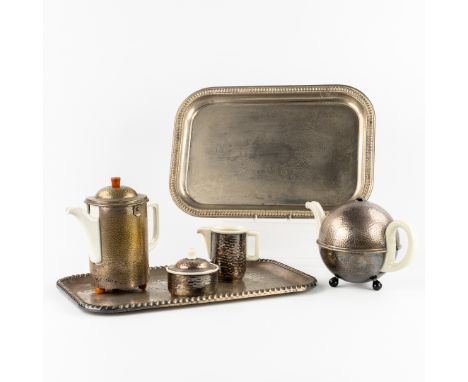 WMF, A Coffee and Tea Set, Hammered Metal with Porcelain Interior. Art Deco.Marked 'WMF' on the bottom and provided with a ca