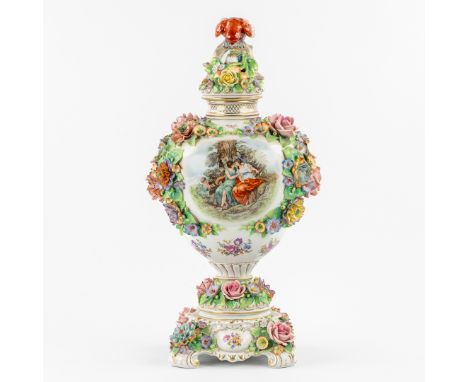 Sitzendorf, Lidded Vase on a Base, Decorated with Flowers and a Parrot. 20th century.Polychrome porcelain.Decorated with flow