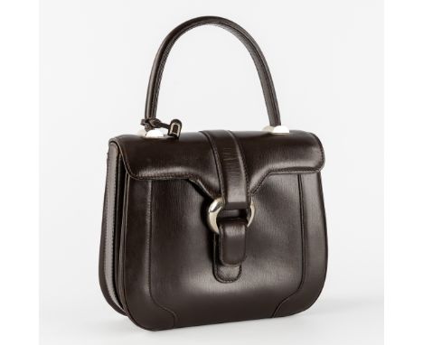 Delvaux, a Vintage Handbag in Dark Brown Leather.Including a fabric storage bag.Overall in good condition with some light use