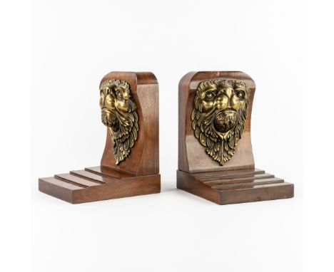 A Pair of Antique Bookends, decorated with Lion Heads. Wood and Bronze.Wooden bookends.Decorated with bronze lion heads, prob