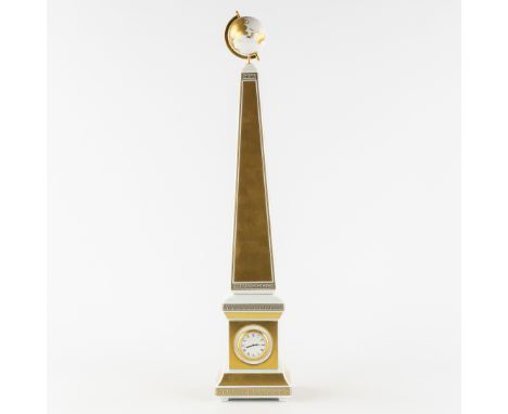 Versace 'Carpe Diem', Rosenthal, an Obelisk Table Clock, Gilt porcelain.Limited Edition 718/999.A table clock in the shape of