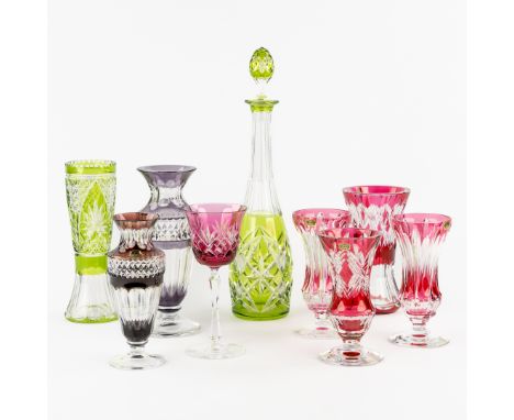 Val Saint Lambert, A collection of 9 pieces of Cut and Colored Crystal.Vase, model Gary, purple colored, signed and numbered 