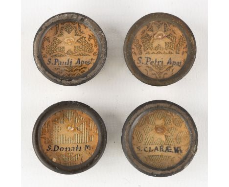 Four sealed theca with relics for Apostles and Saints.S. Clarae. V. - Saint Clara, Virgin.S. Pauli Apost - Saint Paul, Apostl