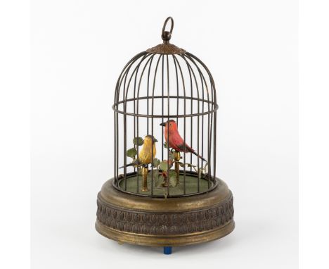 A Brass Birdcage with Automaton. In the style of Maison Bontems, France.Brass birdcage with two singing and moving birds.Mech