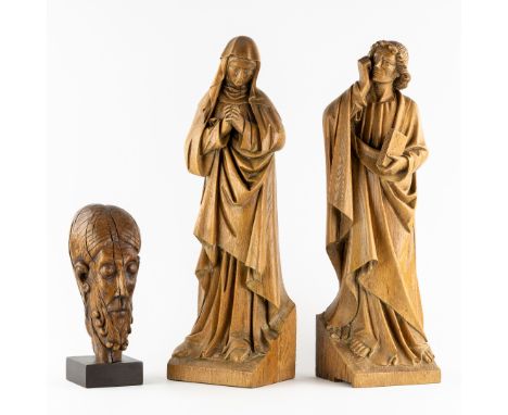 A Wooden Bust of the 'Crooked Christ' of Leuven and a Pair of Antique Wooden sculptures of Mary and John.Sculptured wood.Bust