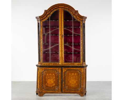 An antique Dutch display cabinet with floral marquetry, The Netherlands. 19th century.High and elegant display cabinet finish