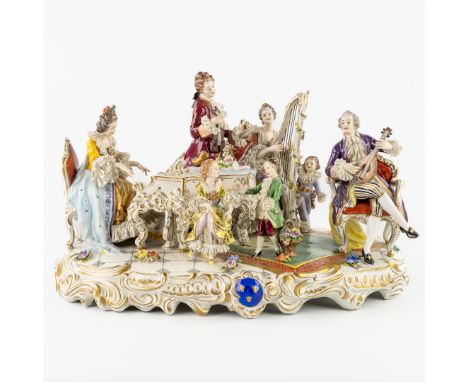 Volkstedt Rudolstadt, A Large Group 'The Musical Chamber', Polychrome Porcelain.Polychrome and lace porcelain.Decor of a cham