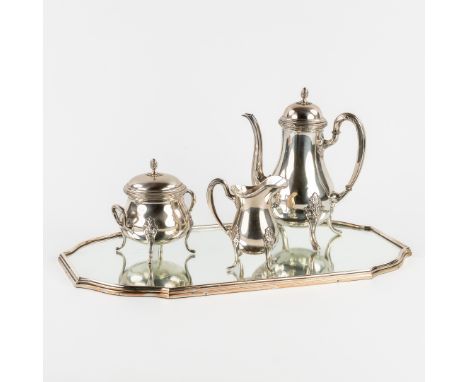 A Silver Coffee Pot, Sugar Pot and Milk Jug. Germany, 1,016kg. Added a Delheid, A Table Mirror.Table mirror (serving tray) wi