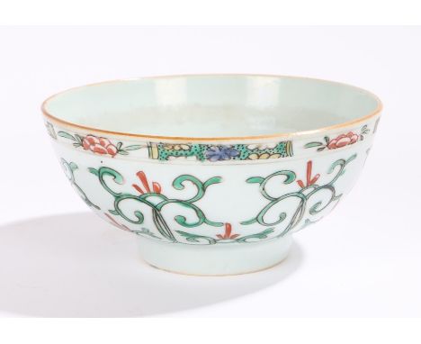 Chinese porcelain bowl, Kangxi, with a central flower to the middle, the exterior with green swags tipped with red leaf desig