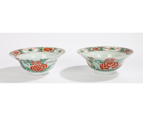 Pair of Chinese famille verte porcelain bowls, Kangxi, with flared lips decorated with flowers and ribbons, the lower part of