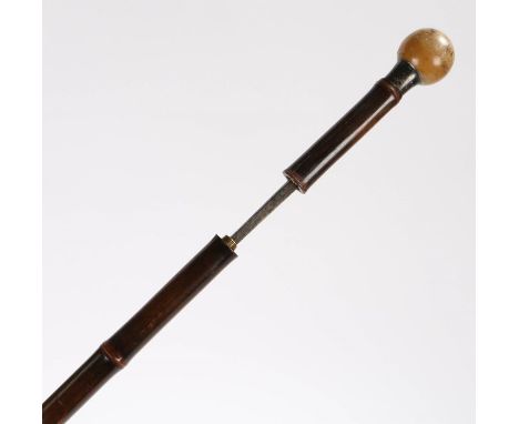 19th Century rhinoceros horn sword stick, the rhinoceros horn ball end above a silver collar assayed for London 1887 above a 