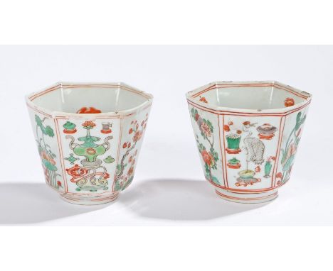 Pair of Chinese famille verte porcelain beakers, Kangxi, of hexagonal form decorated with a standing stork, flowers and objec