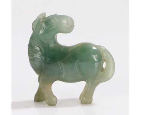 Chinese jade horse, the carved green jade depicting a horse standing on all fours looking behind, 37mm long