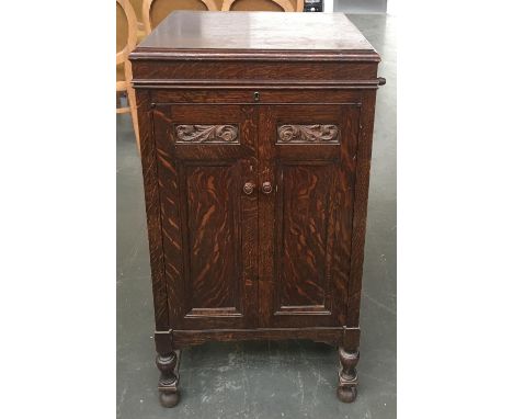An HMV oak cased upright gramophone, with No.5A reproducer, together with a good selection of 78 records, Columbia and Decca,