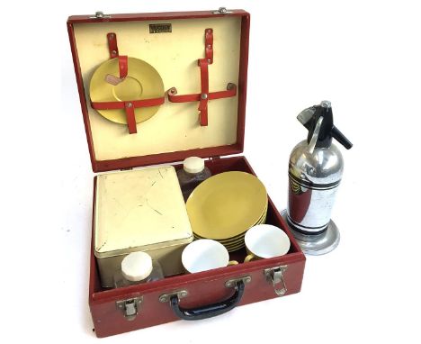 A vintage chrome Sparklets soda syphon and stand together with a Brexton vintage picnic hamper with two glass jars, metal san