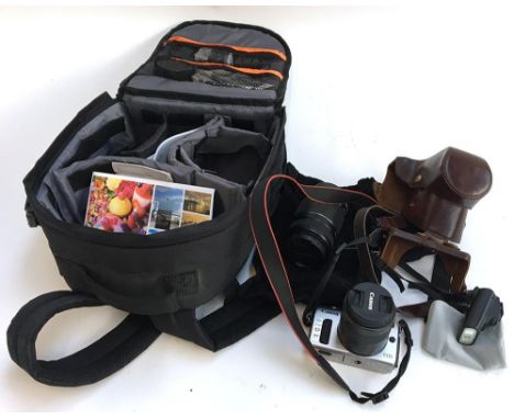 Canon EOS M Digital Camera with Canon 18-55mm Image Stabilizer lens, Canon EF-S55-250mm f/4-5.6 IS II lens, Canon mount adapt