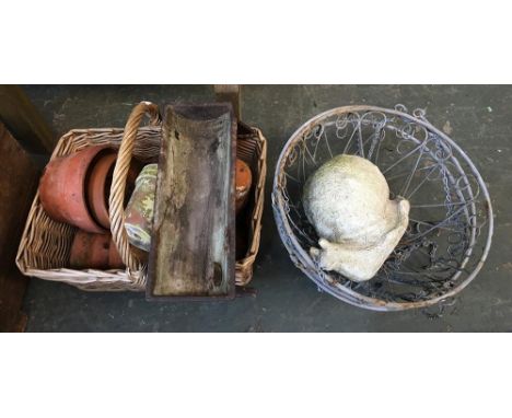 A hanging basket, small trough, and a quantity of terracotta flowerpots 